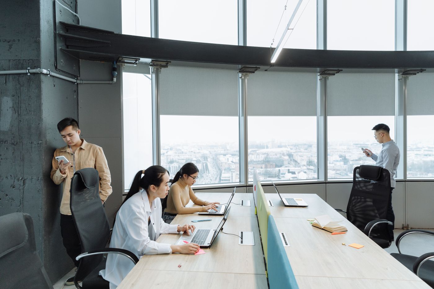 People working in a bright shared office
